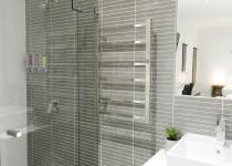 Shower and vanity in Family Studio Room